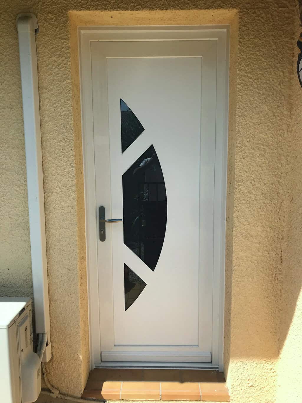Remplacement porte d'entrée PVC Lunel
